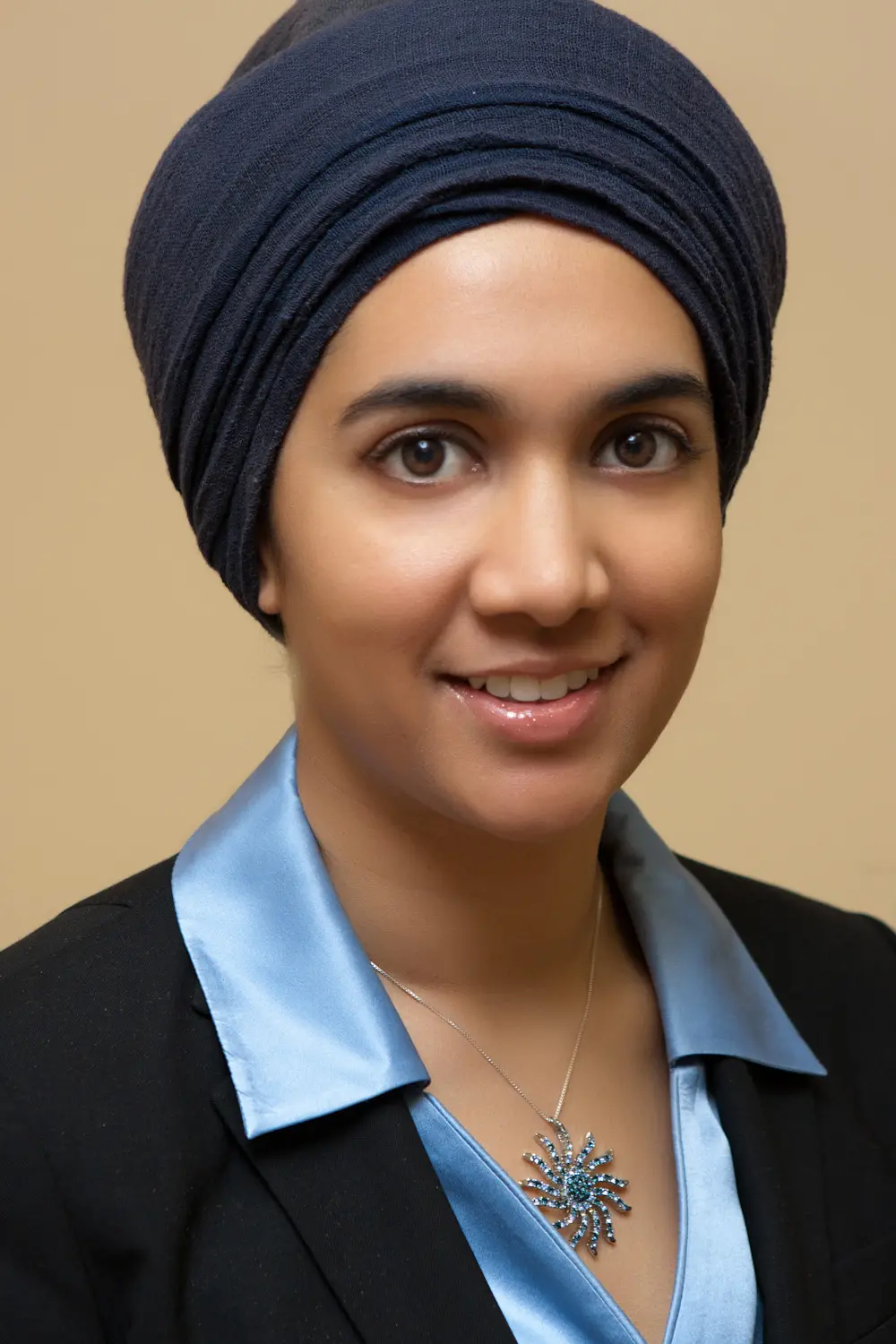 harrup kaur picture 2019 ver 2 A woman with a turban on her head.